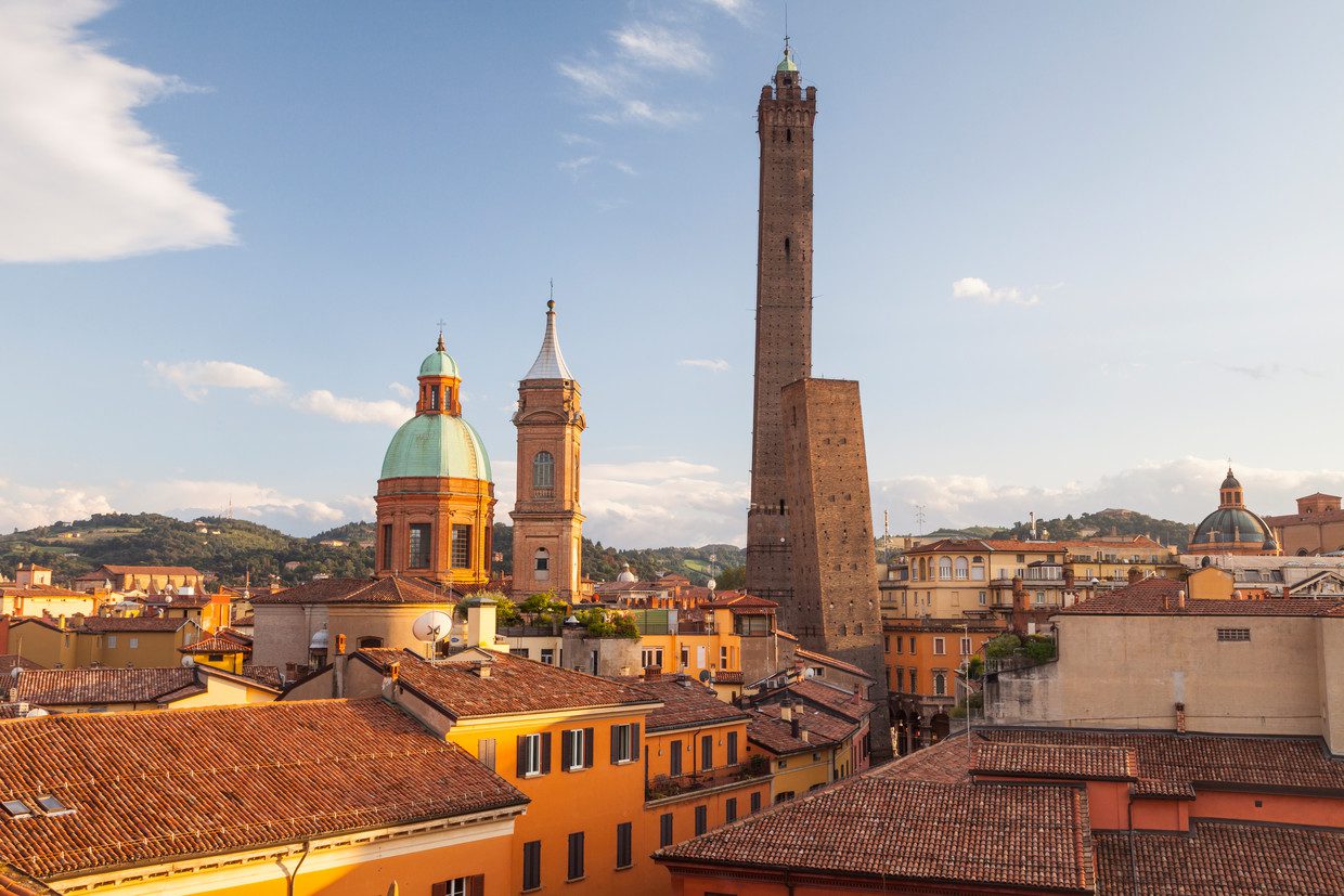 View of Bologna with the soaring Torre Degli Asinelli and the leaning Torre della Garisenda clearly visible next to it.  Image by Getty Images