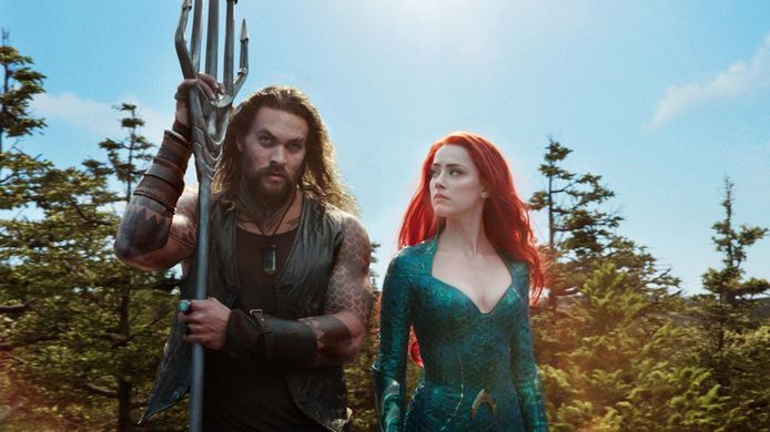 Jason Momoa and Amber Heard in the first Aquaman film in 2018.