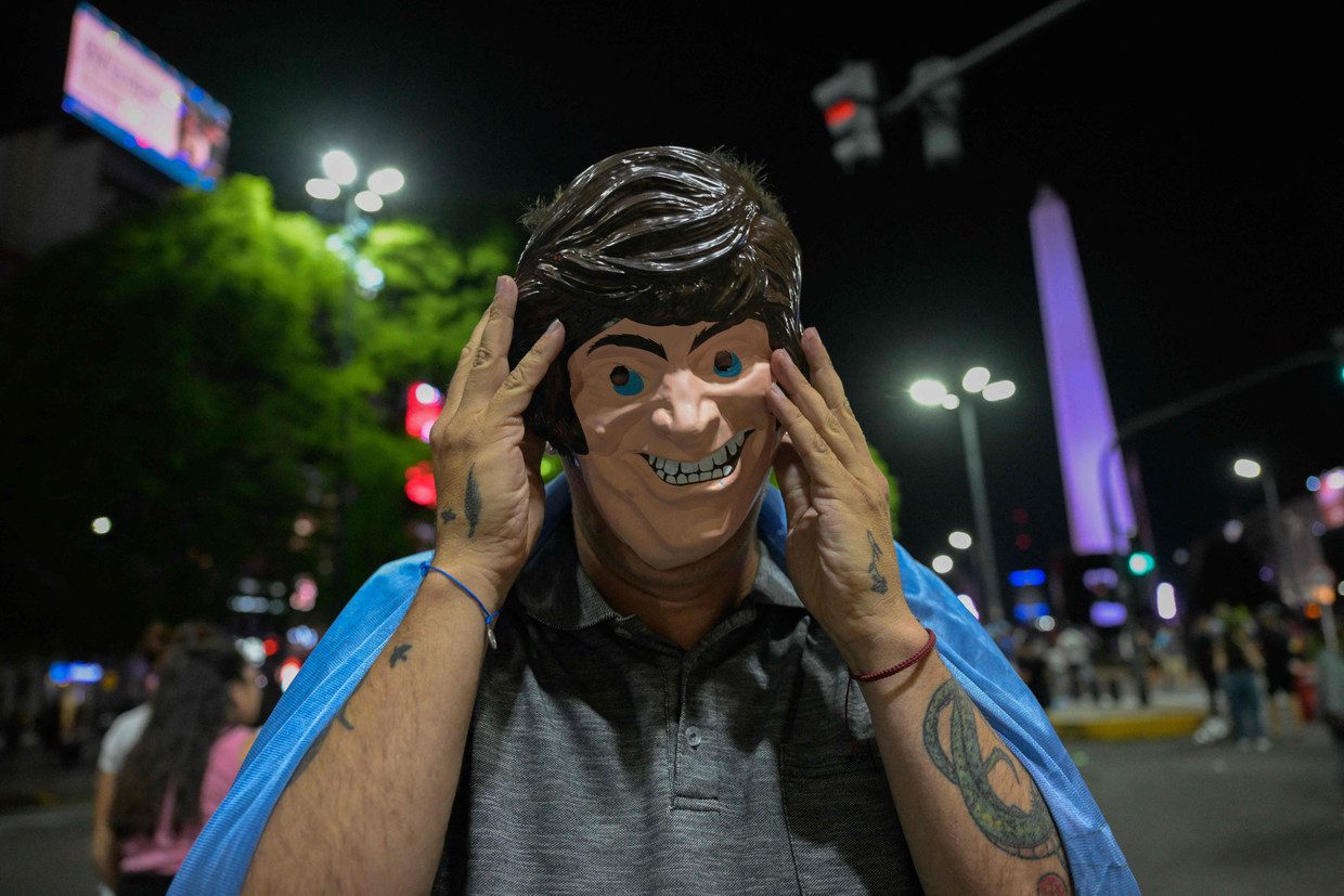 A supporter of Javier Miley celebrates his election victory in Buenos Aires.  Photo by Agence France-Presse