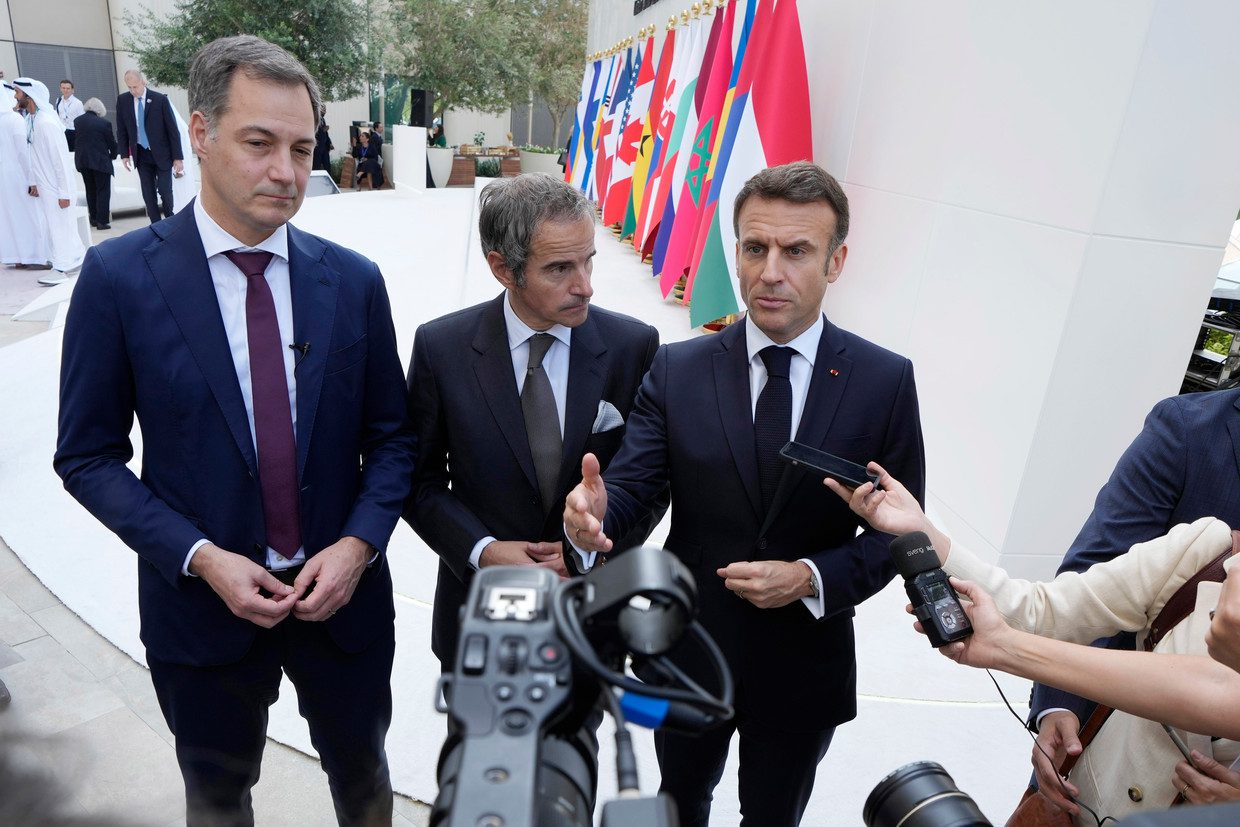 French President Emmanuel Macron (right) speaks to the press alongside Prime Minister Alexandre De Croo (left) and Rafael Grossi.  AP photo