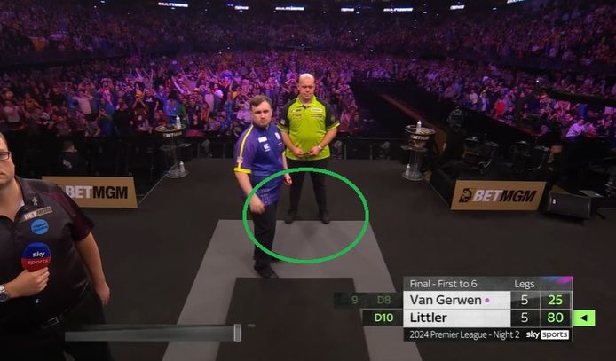 Van Gerwen stands with both feet in the exclusion zone.